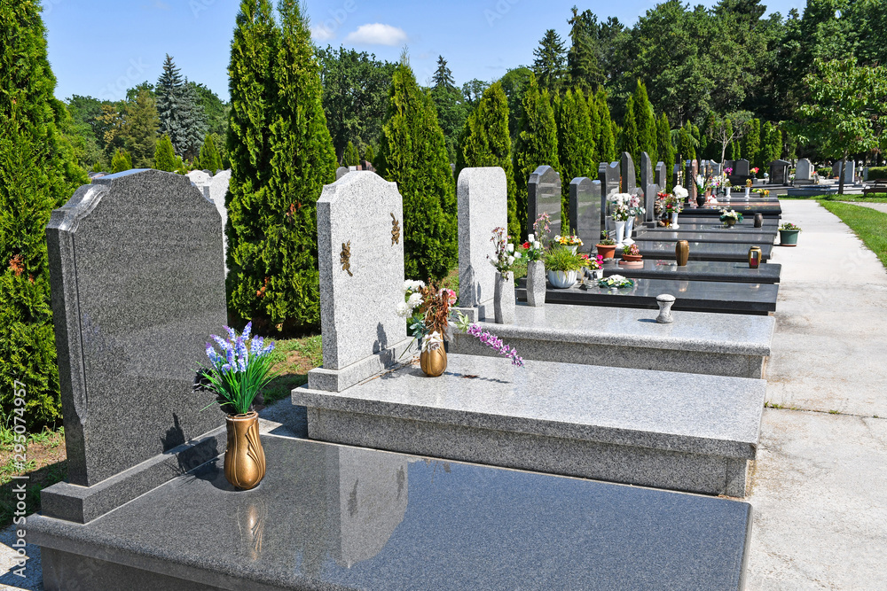 Tombstones in the public cemetery - obrazy, fototapety, plakaty 