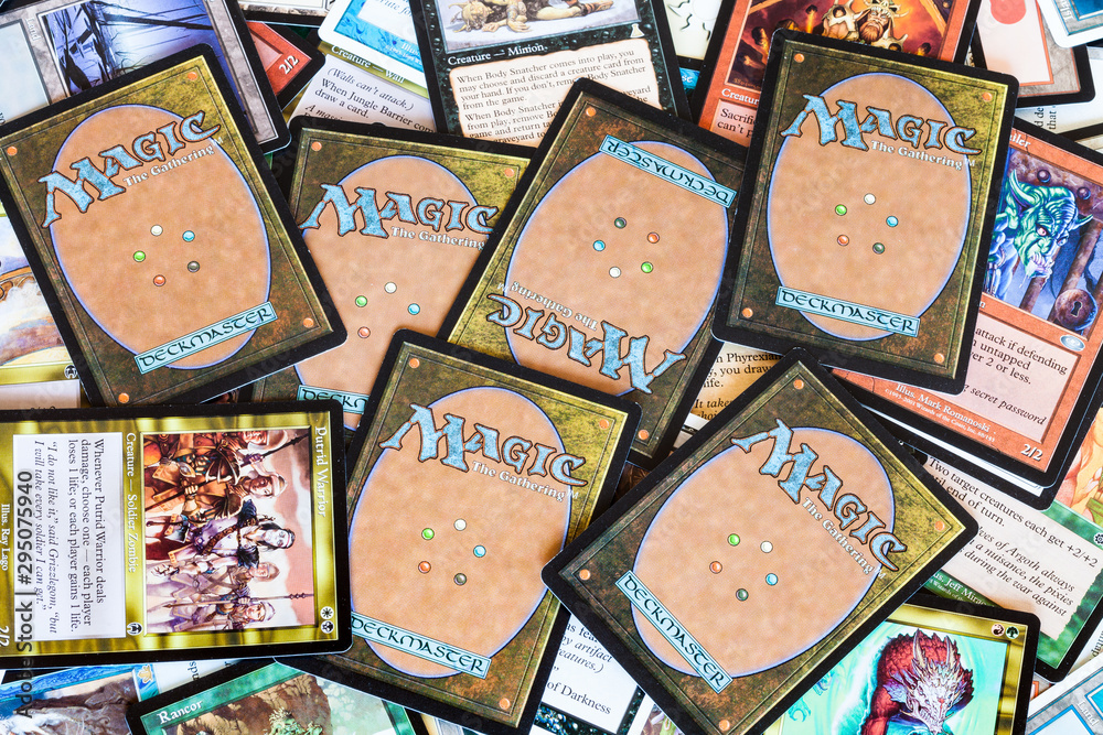 The First Magic Card Set MOSCOW, RUSSIA - APRIL 2, 2019: back sides and faces of many cards of ...