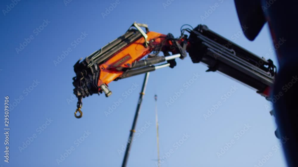 Kran mit Haken an Hafen - crane with hook in the harbor Kran mit Haken an Hafen - crane with hook in the harbor