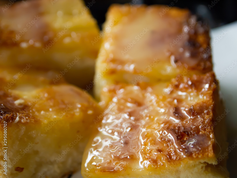 Toast bread butter and sweetened condensed milk, Close up and Macro shot, Selective focus, Snack food concept Toast bread butter and sweetened condensed milk, Close up and Macro shot, Selective focus, Snack food concept