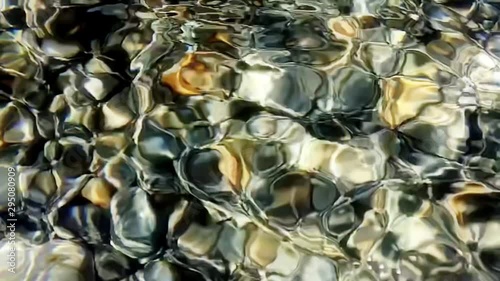 A truely amazing and psyhedellic macro and slow motion view of a clean brook 
