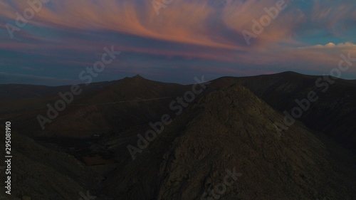 walk through a beautiful landscape with the sunset between the sky and the land