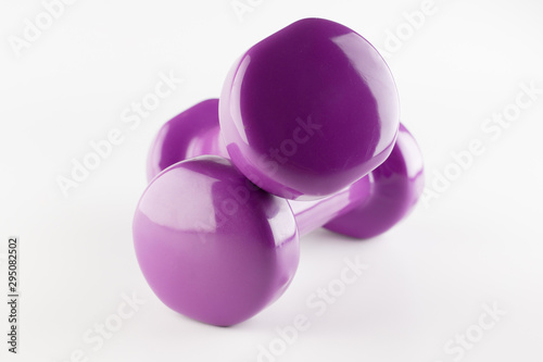 one kilogram purple dumbbells © Aliaksei Luskin