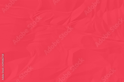 crumpled red paper background close up