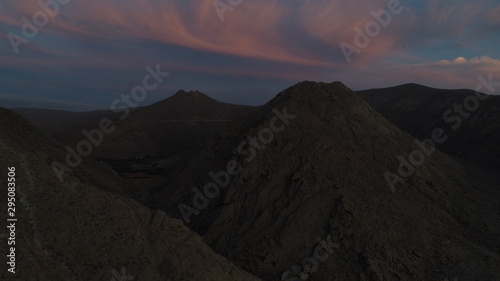 walk through a beautiful landscape with the sunset between the sky and the land