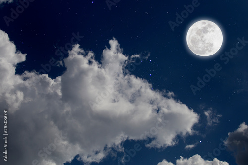 Full moon with starry and clouds background. Romantic night.