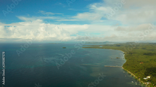 Tropical islands in turquoise lagoon and coral reef water, aerial view. Summer and travel vacation concept. Siargao,Philippines.
