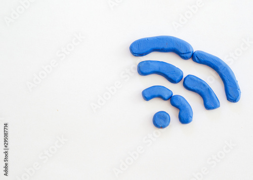 Wifi symbol drawn from modelling clay with copy-space