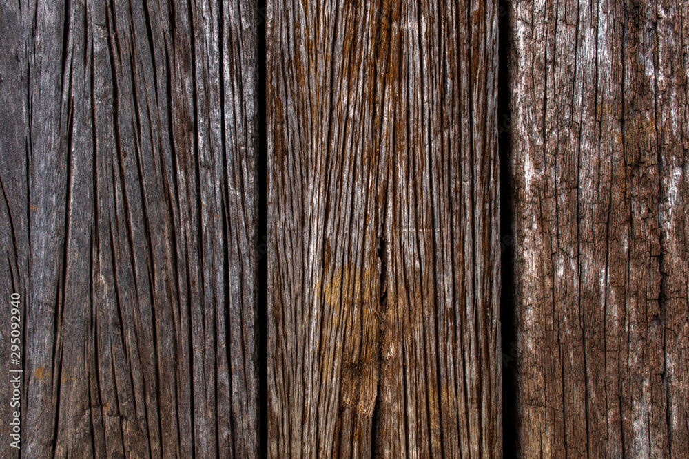 Old wooden background. Grunge background of old brown wooden plank. Vertical stripes Old wooden background. Grunge background of old brown wooden plank. Vertical stripes