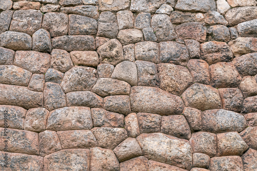 Natural stone abstract background wall made by ancient Inca of Peru in South America. Background with copy space Natural stone abstract background wall made by ancient Inca of Peru in South America. Background with copy space