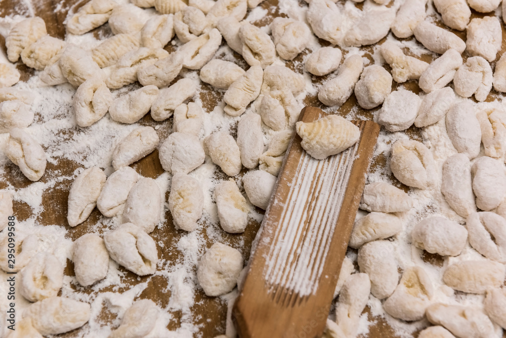Fototapeta premium Handmade gnocchi on the table.