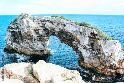 Es Pontàs, a natural arch between the Cala Santanyí and Cala Llombards on the island Mallorca in Spain.