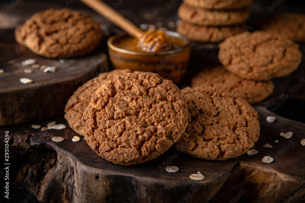 Biscuit with berry or fruit filling. Crispy and crumbly delicious cookies with natural ingredients: flour, nuts, seeds, pieces of chocolate, cocoa, fruit jams. Stylish still life for poster. Biscuit with berry or fruit filling. Crispy and crumbly delicious cookies with natural ingredients: flour, nuts, seeds, pieces of chocolate, cocoa, fruit jams. Stylish still life for poster.