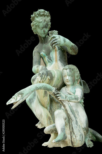 Olympic goddess of love Aphrodite (Venus) with Cupid sitting on swan. Ancient statue.