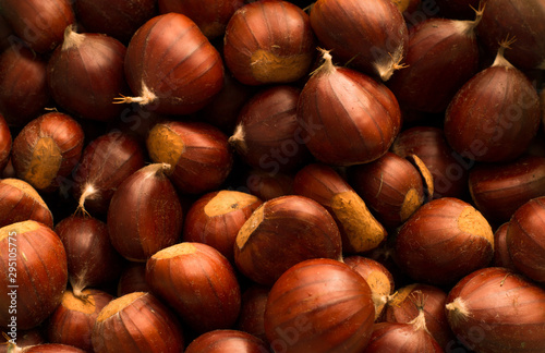 ripe raw chestnuts. Food background.