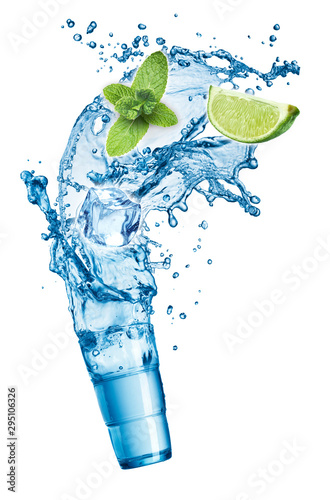 Ice cubes, mint leaves, water splash, lime and glass on a white background. Mojito