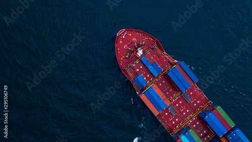 Aerial view cargo ship transportation of business logistic sea freight, Cargo ship, Cargo container in factory harbor at industrial estate for import export around in the world, Trade Port / Shipping