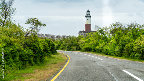 Long Island, New York. USA. Green field on a National Park, on the Atlantic Ocean at the eastern tip of the Island. Montauk Light was the first lighthouse in New York State.