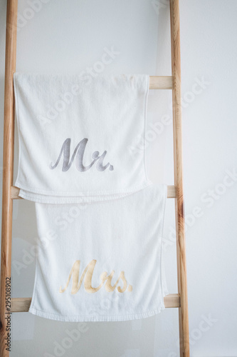 Towel for couple 'Mr and Mrs' hang on wooden ladder