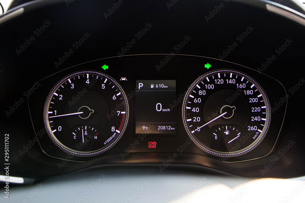 Close up image of korean car speedometer. Modern car interior dashboard details.