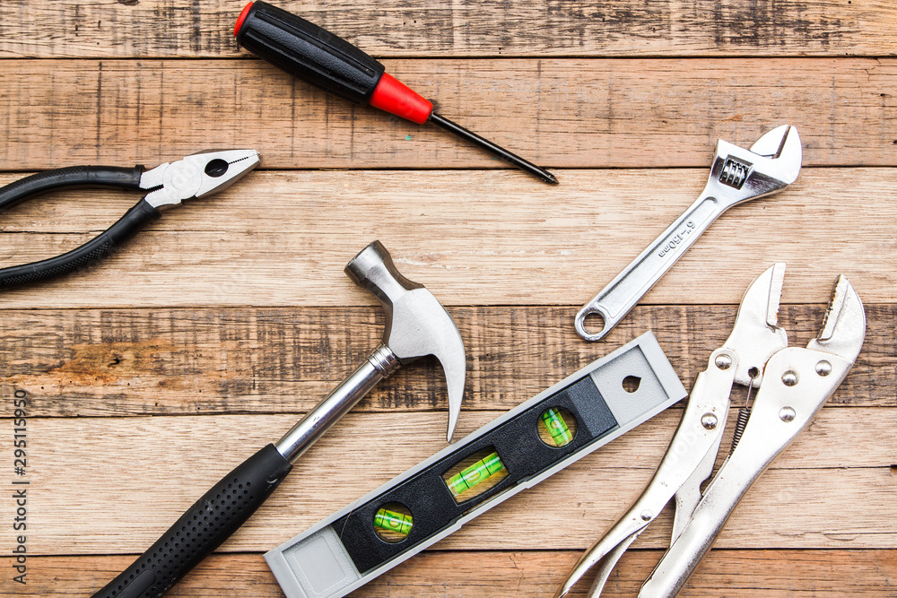 Carpenter tool for wood working hammer drill and etc. for building construction by hand, Equipment for wood industry put on wood bakcground . Carpenter tool for wood working hammer drill and etc. for building construction by hand, Equipment for wood industry put on wood bakcground .