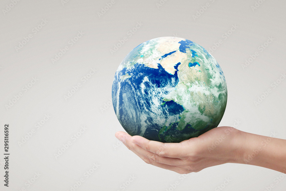 Globe ,earth in hand, holding our planet glowing. Earth image provided by Nasa Globe ,earth in hand, holding our planet glowing. Earth image provided by Nasa