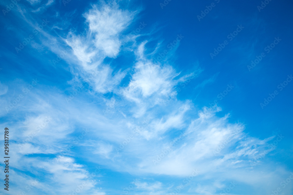 white fluffy clouds in the blue sky