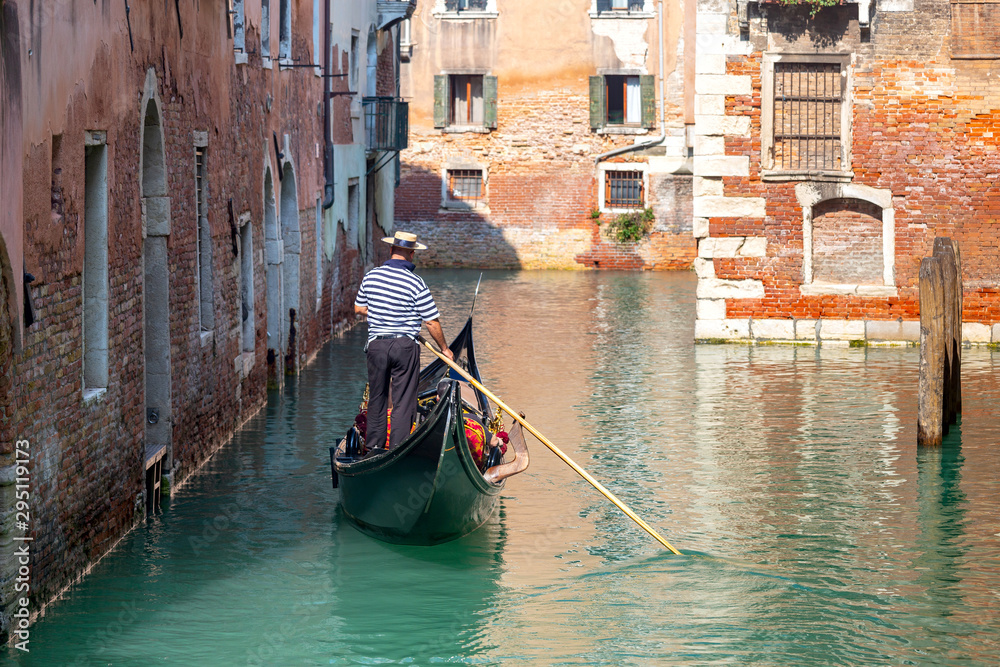 Venice. Gondolier in the gondola.