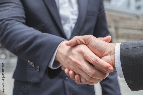 Shaking hands deal success good job. Meeting, negotiation, greeting or welcome to business partners. Partnership or Teamwork and handshake Concept