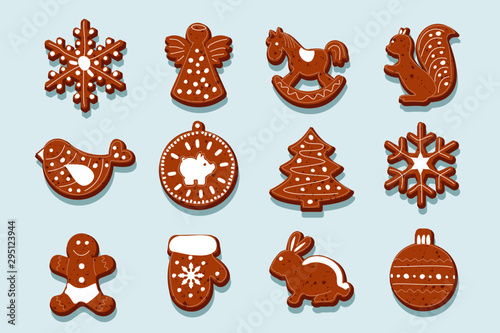 Vector cartoon set of Christmas toys holidays ginger cookies, isolated on white background. Merry Christmas and New Year, the figures are covered with powdered sugar