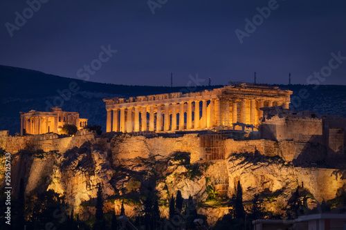 Parthenon and Herodium construction in Acropolis Hill in Athens, Greece shot in blue hour.