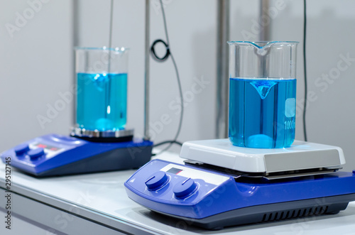 A magnetic stirrer or magnetic mixer is a laboratory device that employs a rotating magnetic field to cause a stir bar immersed in a liquid to spin very quickly, thus stirring it.