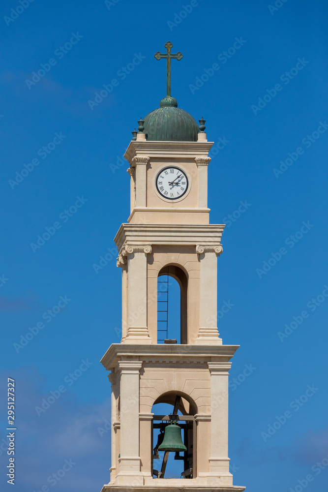 Closeup view on top part of bell tower of monastery saint Peter