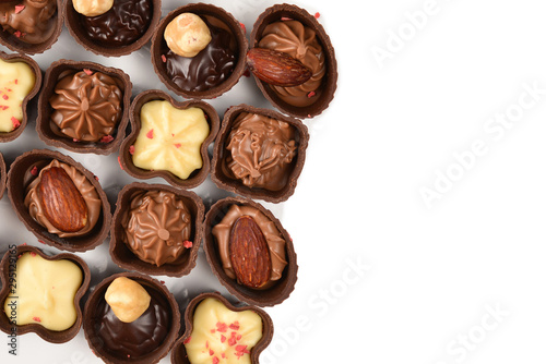 Mix of tasty chocolate candy collection isolated on white. Copy space.