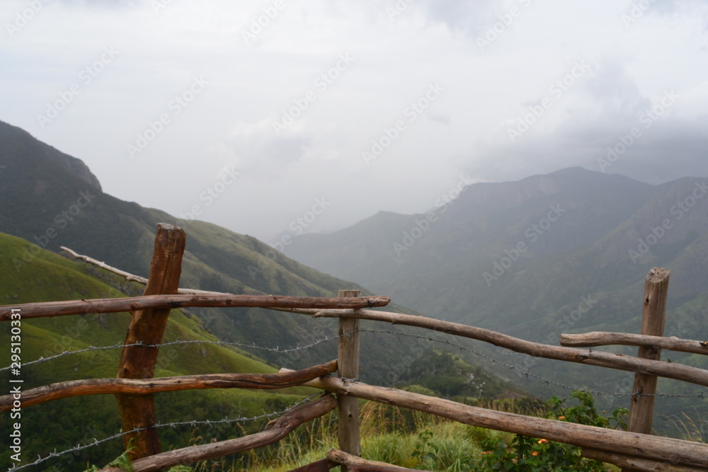 old wooden fence on mountain, top station in munnar kerala old wooden fence on mountain, top station in munnar kerala