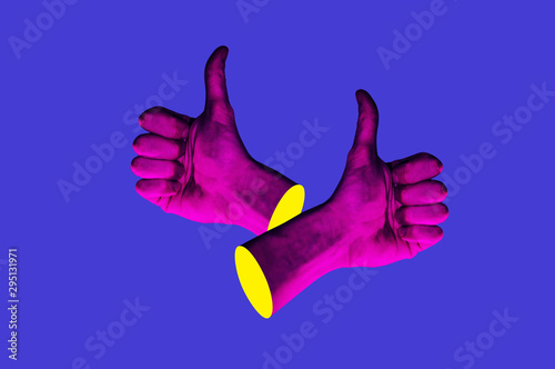 Contemporary minimalistic art collage in neon bold colors with hands showing thumbs up. Like sign surrealism creative wallpaper. photo