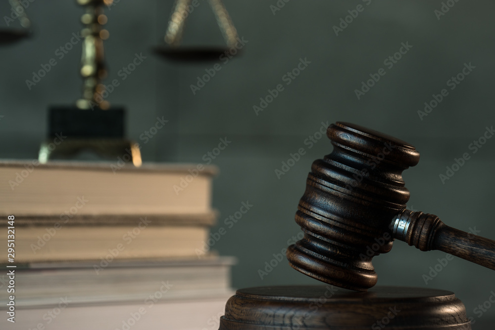 Law and Justice, judge gavel with scales on wooden table with blurred background. Law and Justice, judge gavel with scales on wooden table with blurred background.