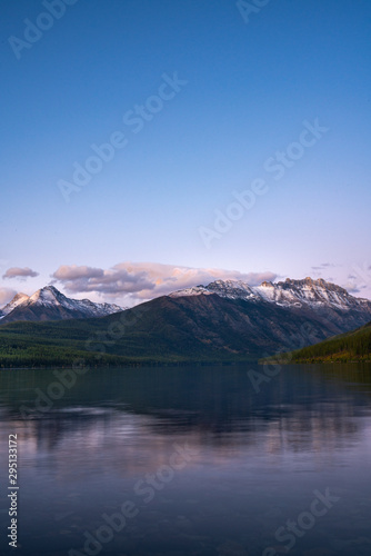 The amazingly beautiful Kinkla Lake with the snow covered mountains in the background at Sunset, Glacier Park, Montana.