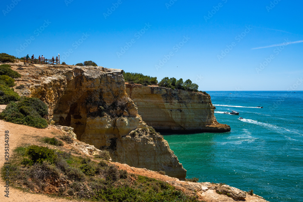 Imposing cliffs of Algarve overlooking the Atlantic Ocean above the Benagil cave, Lagoa, Portugal