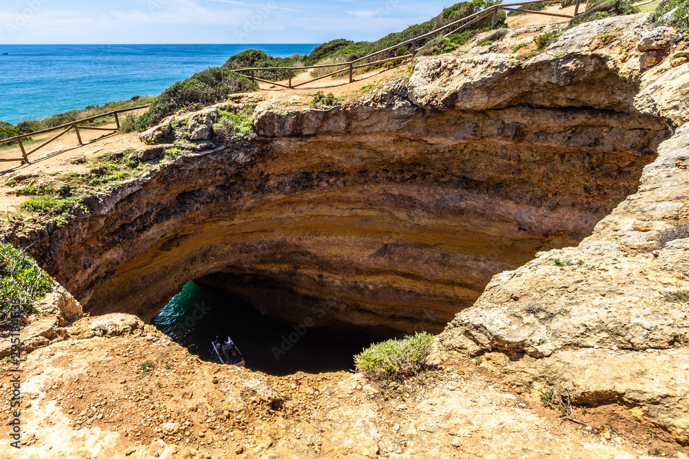 Fototapeta premium The big hole on the cliffs above the Benagil cave (Algar de Banagil), Lagoa, Algarve, Portugal