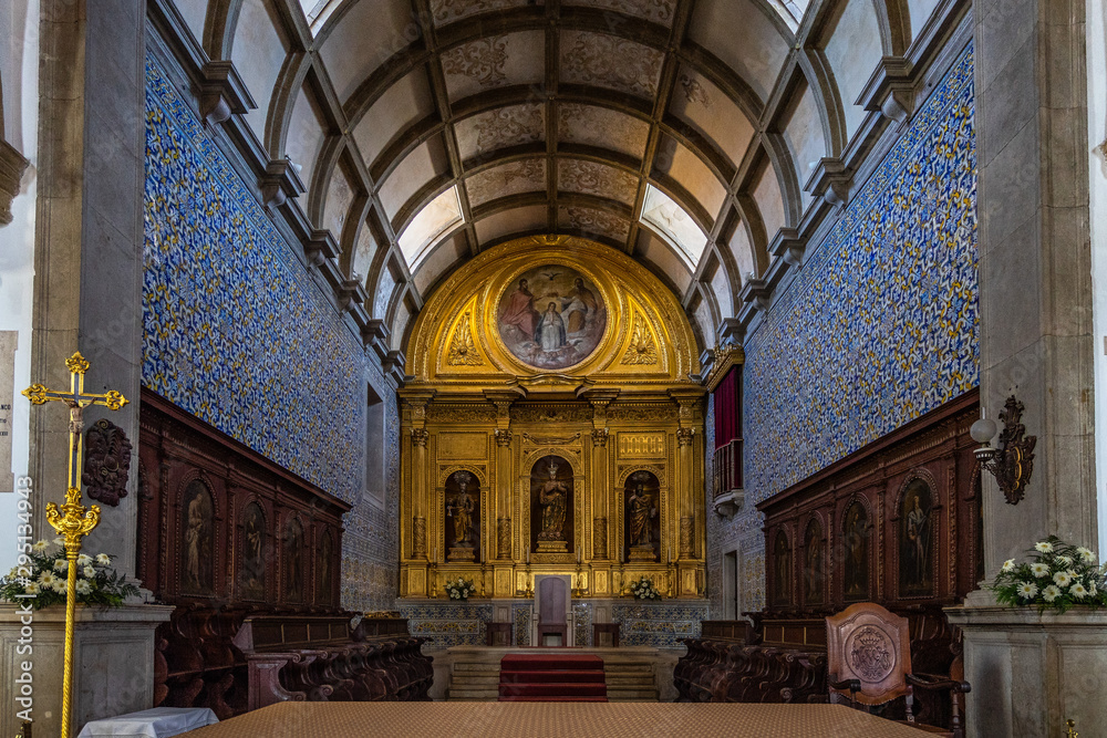 Fototapeta premium Main altar of Faro Cathedral (Sé Catedral) with walls finely decorated by azulejos tiles, Algarve, Portugal