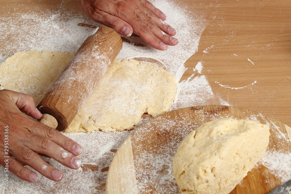 Making Croissant Cookies with Jam. Series. Rolling dough. Making Croissant Cookies with Jam. Series. Rolling dough.