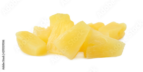 Pieces of delicious sweet canned pineapple on white background, closeup