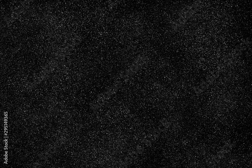 Snow on black background. Christmas or New Year mockup texture.