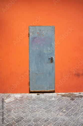 old door in brick wall © Jareck