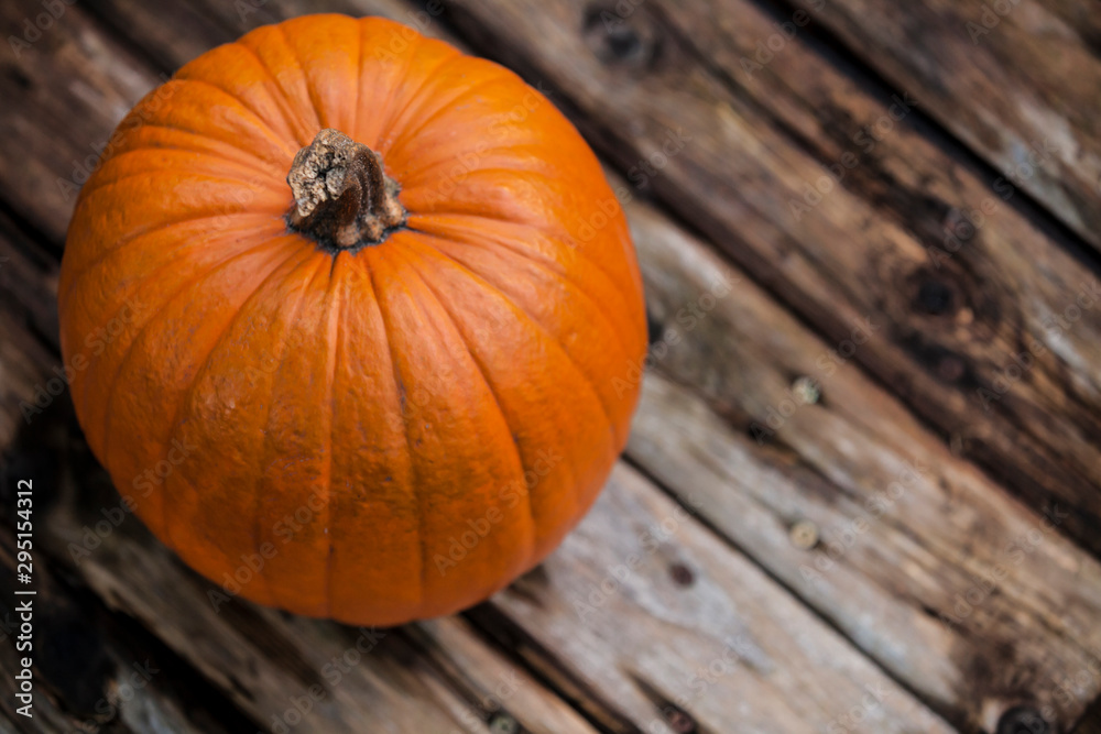 pumpkin on wooden table