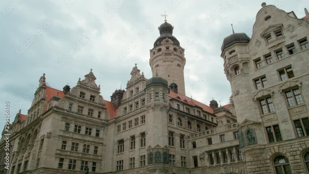 New Town Hall - Neues Rathaus - Monumental Building in style of German Late Renaissance in Leipzig's Old Town, Germany, Europe. 4K Background Panning Low Angle Shot New Town Hall - Neues Rathaus - Monumental Building in style of German Late Renaissance in Leipzig's Old Town, Germany, Europe. 4K Background Panning Low Angle Shot