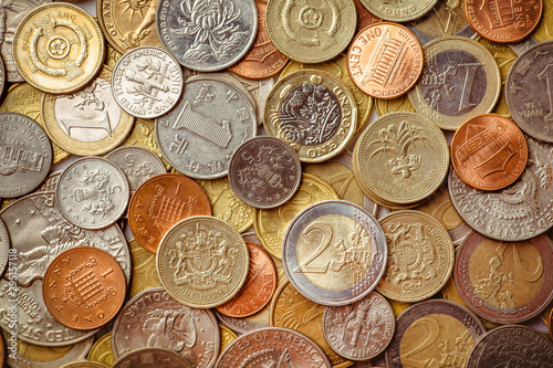 Background of Euro coins money.United kingdom Pound coin.US coins.Group of coins photo