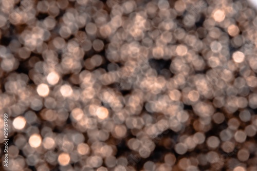 Beautiful colorful festive blurred background for christmas design, copy space. Unique gold color backdrop. Golden sparkles defocused, new year celebration design