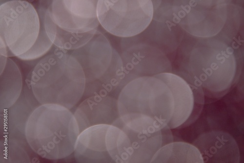 Beautiful colorful festive blurred background for christmas design, copy space. Unique powder pink and emerald green and light gold color backdrop. 
